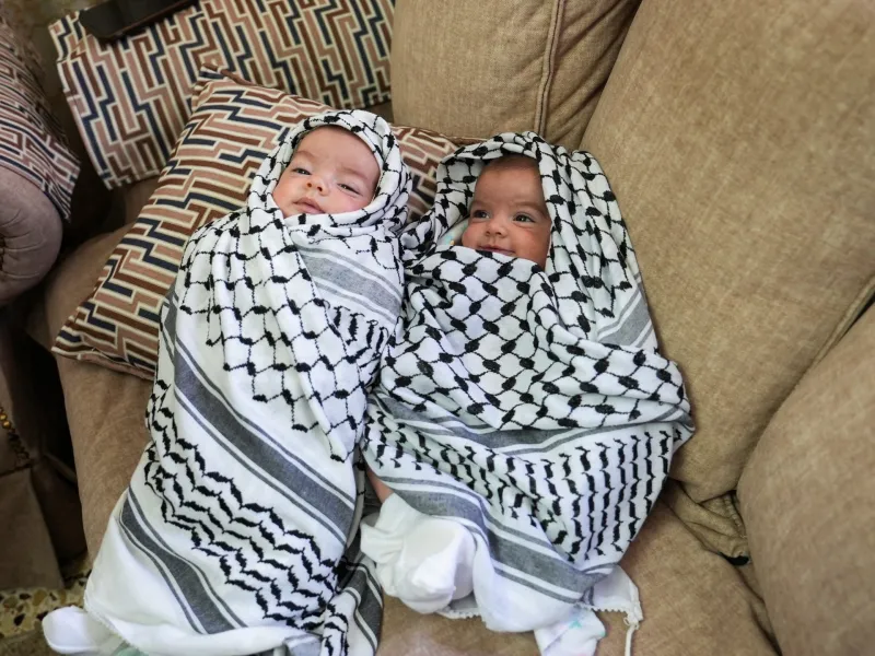 Baby twins attend their father’s funeral after Israeli settler attack