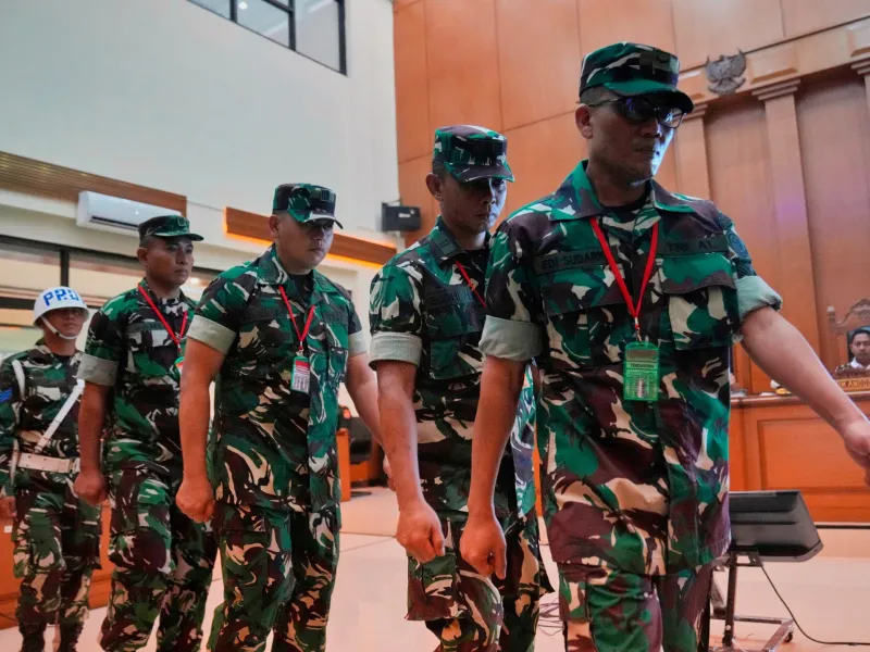 Indonesia puts four soldiers on trial over acid attack on activist