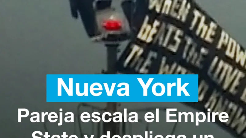Nueva York: pareja escala el Empire State y despliega un mensaje por la paz mundial